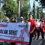 Meriah dan Penuh Semangat: Jalan Sehat HUT RI di Desa Kaliputu Kudus Dapat Doorprize Menarik